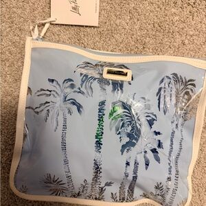 Lilly Pulitzer tropical wet bag with towel stakes, scrunchies and cup holder